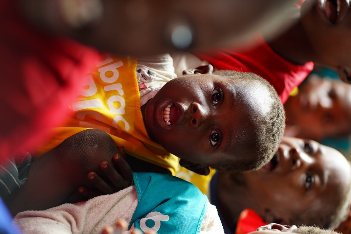 Child smiling with pure joy