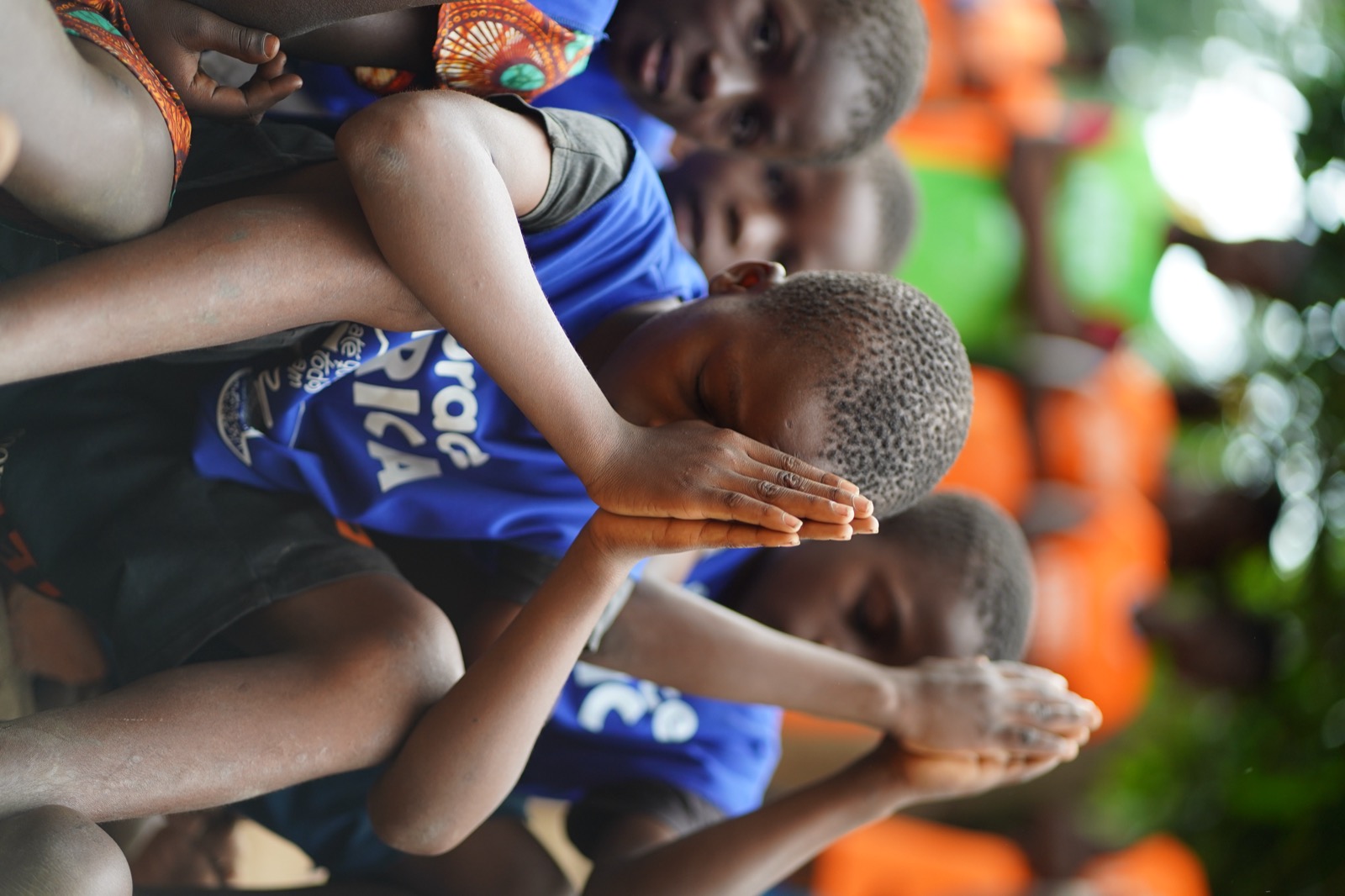 Children praying together